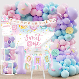 Monnberry donut world backdrop for adorable first birthday photos.
