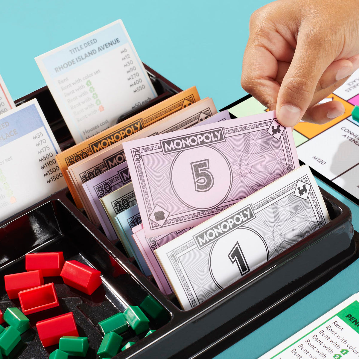 Monopoly board game scene set up for a lively family game night.