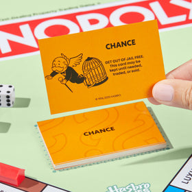 Monopoly family game night setup encourages friendly competition and bonding.