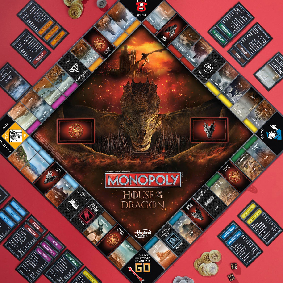 Six golden tokens from Monopoly House of the Dragon edition representing houses for strategic loyalty.