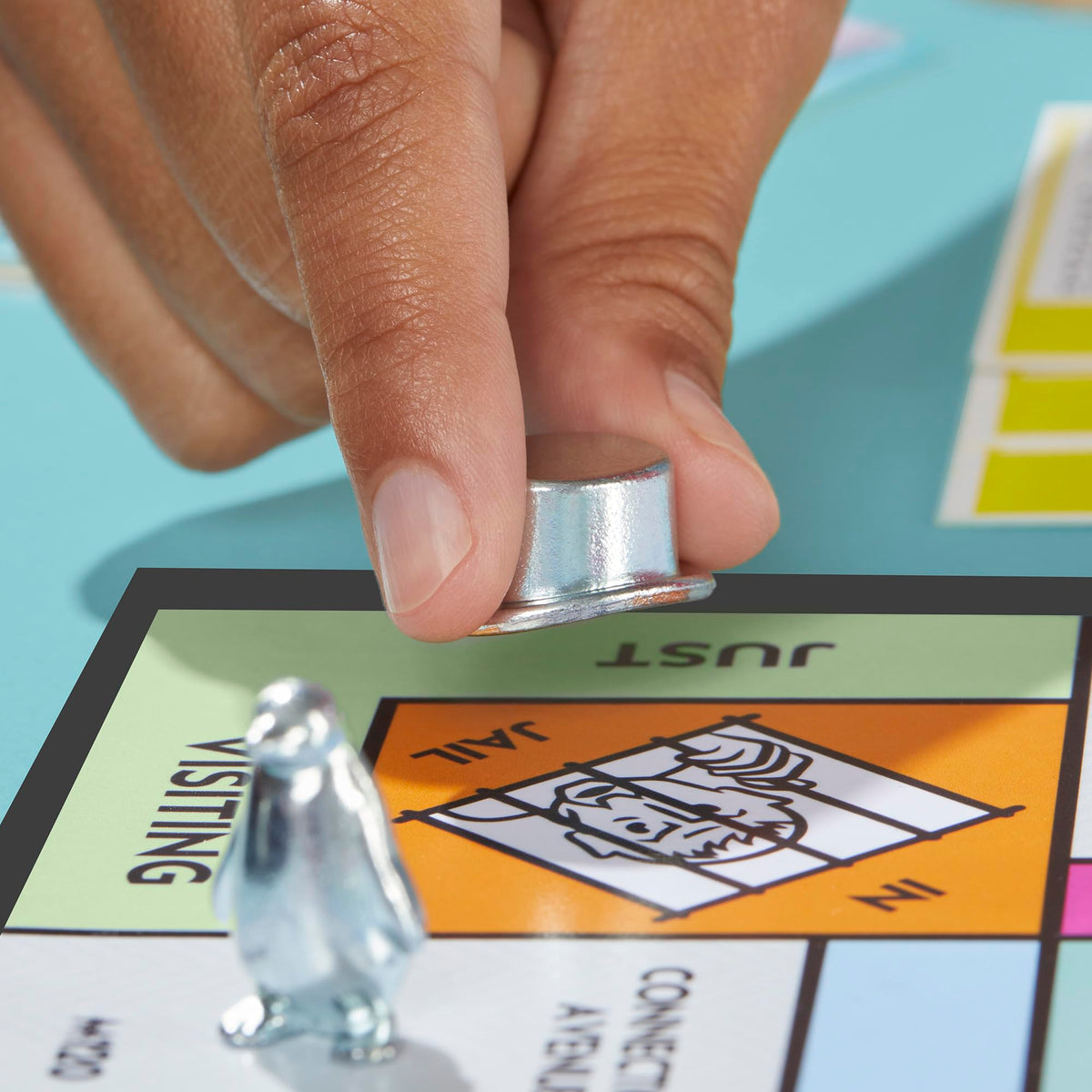 Monopoly money and title deeds organized for smooth property trades.
