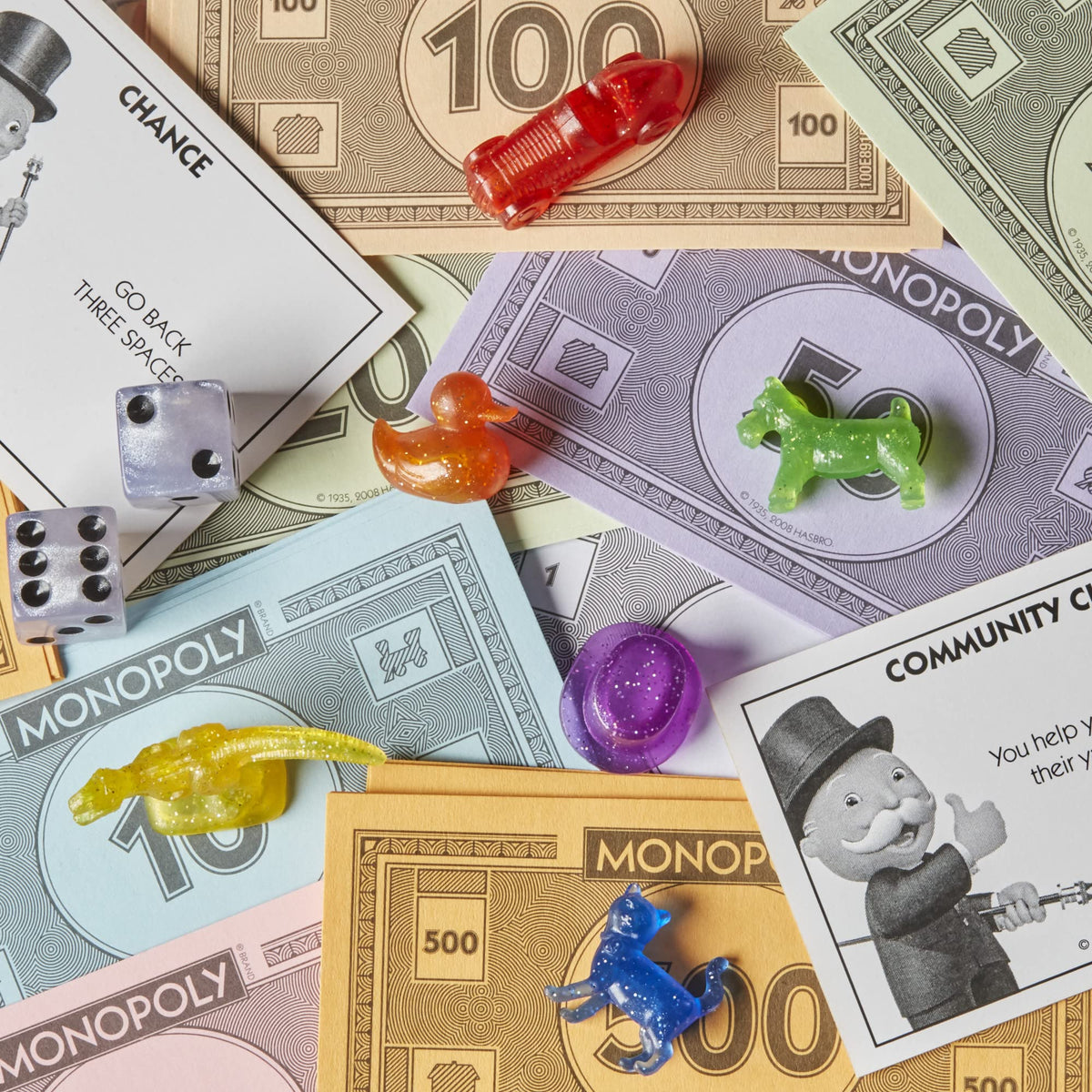 Monopoly Sparkle Edition sparkly gameboard design enhances family game night.