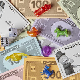 Monopoly Sparkle Edition sparkly gameboard design enhances family game night.