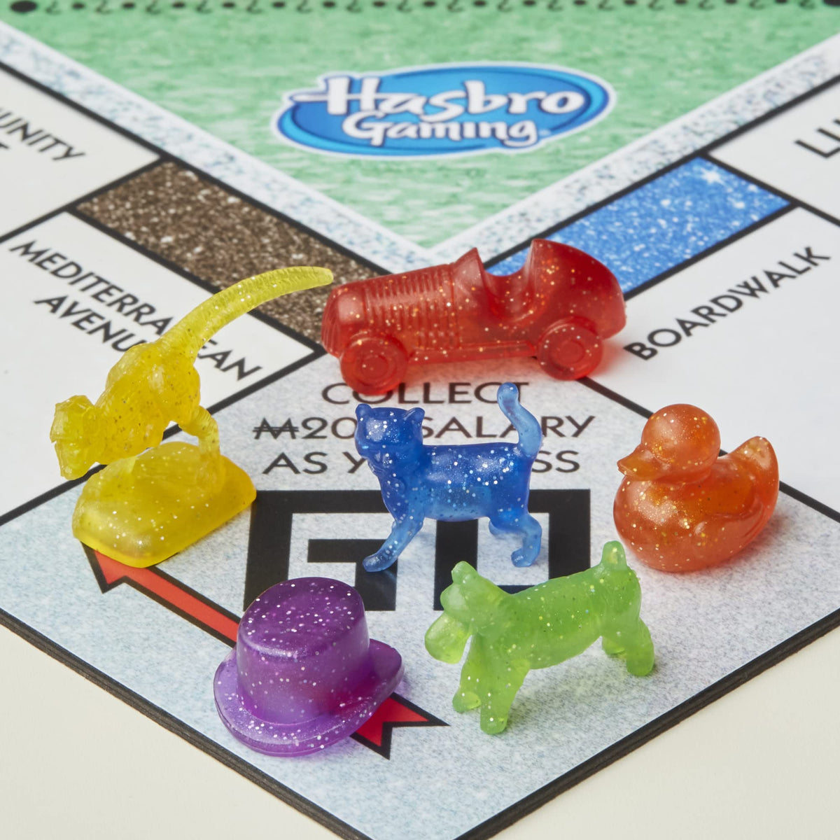 Monopoly Sparkle Edition glitter hotels shine as players bid.
