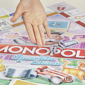 Monopoly Sparkle Edition glitter-infused houses sparkle during play.