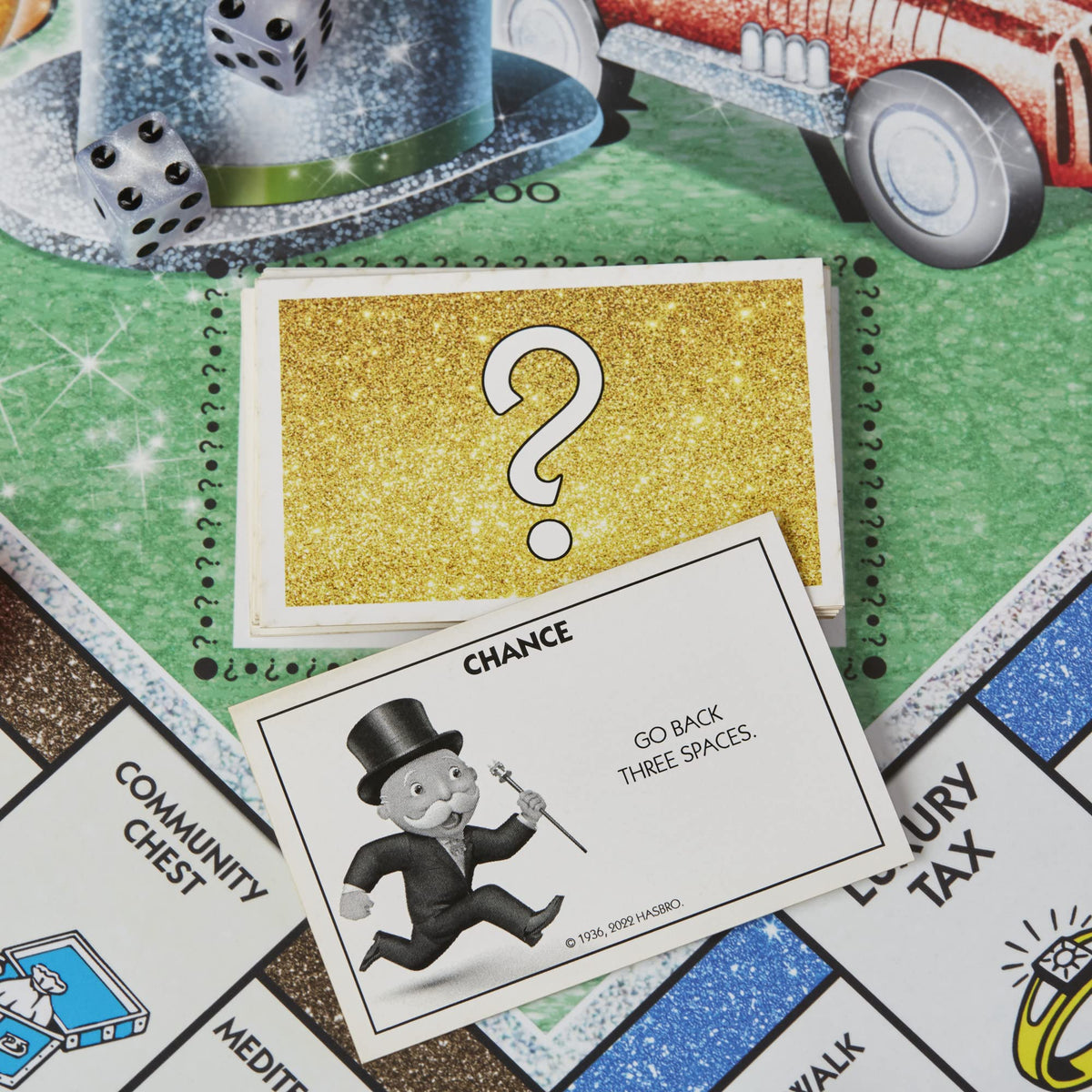Monopoly Sparkle Edition glittery property cards for colorful trading.