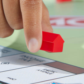 Monopoly table-top setup promotes shared fun during group play.