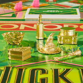 Monopoly Wicked Edition Emerald Castles upgrade property strategy.