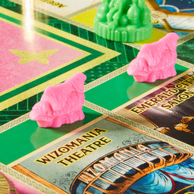 Monopoly Wicked Edition Munchkin homes add whimsy.