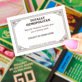 Monopoly Wicked Edition Ozian cards bring film moments to life.