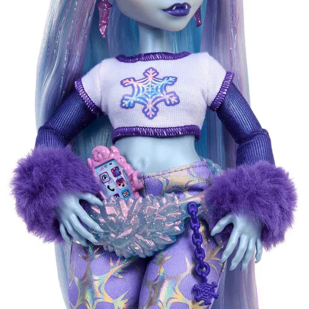 Abbey Bominable snowflake outfit highlights frosty fashion play.