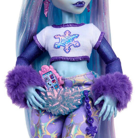 Abbey Bominable snowflake outfit highlights frosty fashion play.