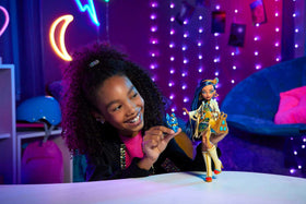 Monster High Cleo De Nile wearing a fringe jacket for a dramatic, fashion-forward look.