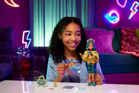 Monster High Cleo De Nile wearing a gold fringe top, great for role-play styling.