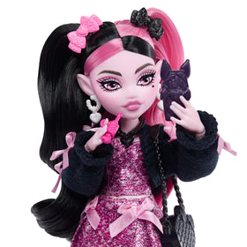 Draculaura wearing a black cardigan for versatile fashion play.