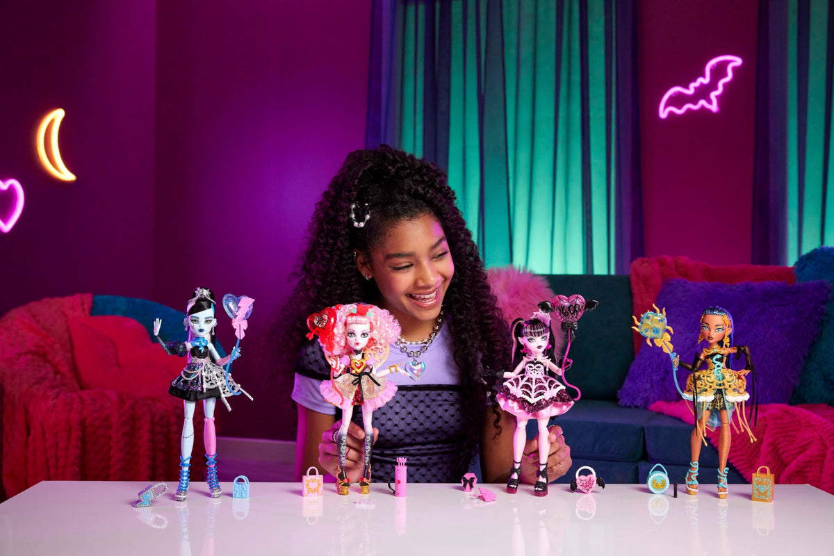 Monster High Frankie Stein plaid sleeve and silvery skirt add dramatic style for pretend parties.