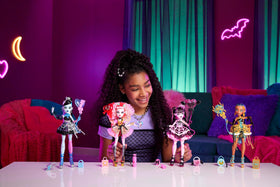 Monster High Frankie Stein plaid sleeve and silvery skirt add dramatic style for pretend parties.