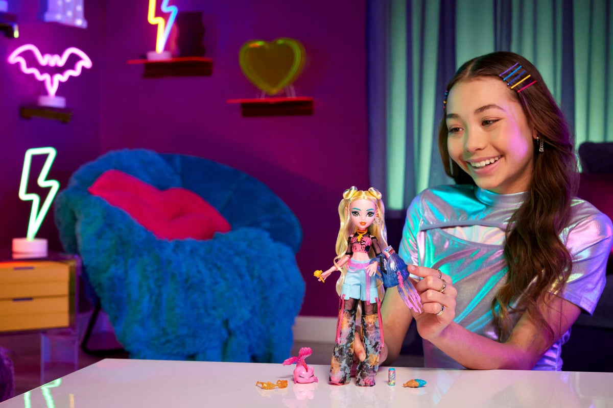 Monster High Lagoona Blue with Neptuna the pet fish for storytelling fun.