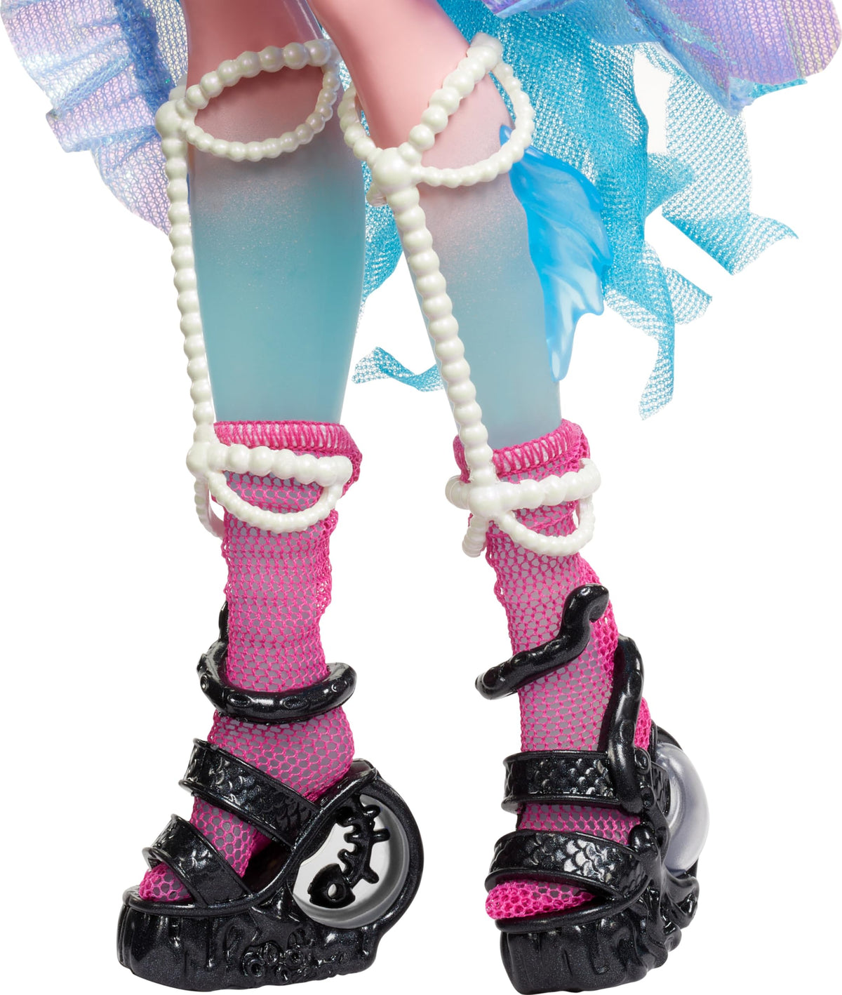 Bubble heels and draped pearls elevate Lagoona’s festival outfit during play
