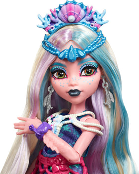 Shell headpiece and hair accents add glam for pretend concerts with Lagoona