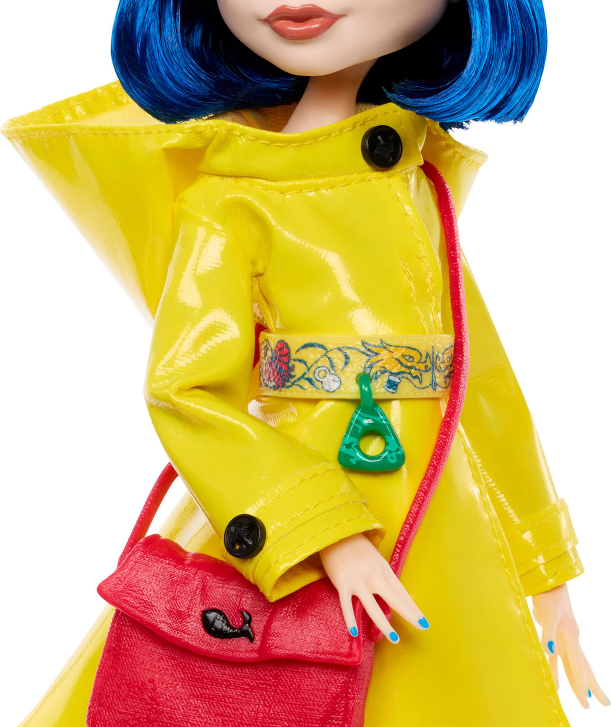 Monster High Coraline raincoat hood and button details showcase authentic design.