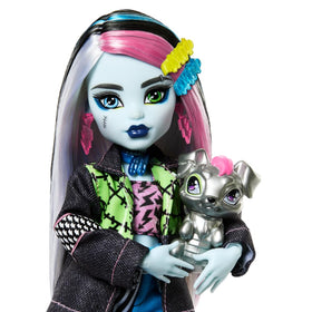 Watzie the metallic silver dog accompanies Monster High Frankie Stein for playful adventures.