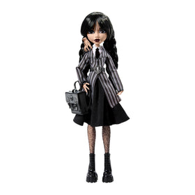 Thing companion figure beside Wednesday for imaginative play scenarios.
