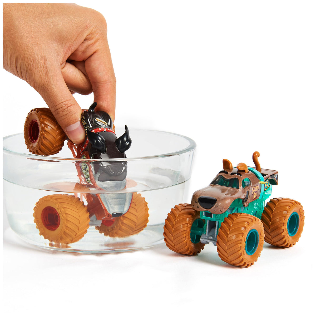 BKT tires and authentic chassis detail on the color-changing 1:64 trucks.