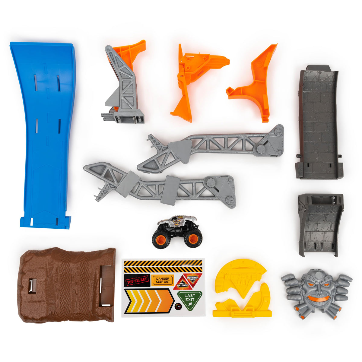 Side structures and stunt piece add modular play patterns for creative play.