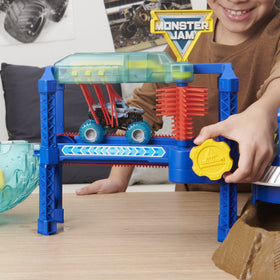 Monster Jam Megalodon Monster Wash spinning brushes deliver scrubbing action for a satisfying clean