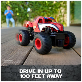 Outdoor-ready Monster Jam Spider-Man RC truck on pavement surface