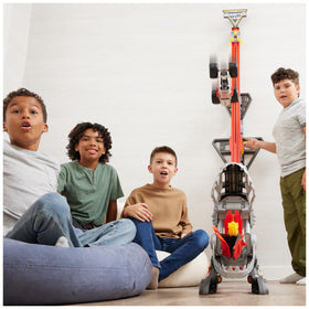 Space at the base holds four additional 1:64 Monster Jam trucks