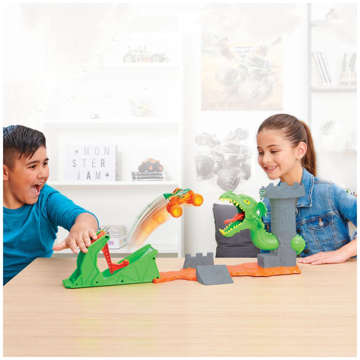 Launcher and lava ramp enable dynamic stunts and thrilling launches across the playset.