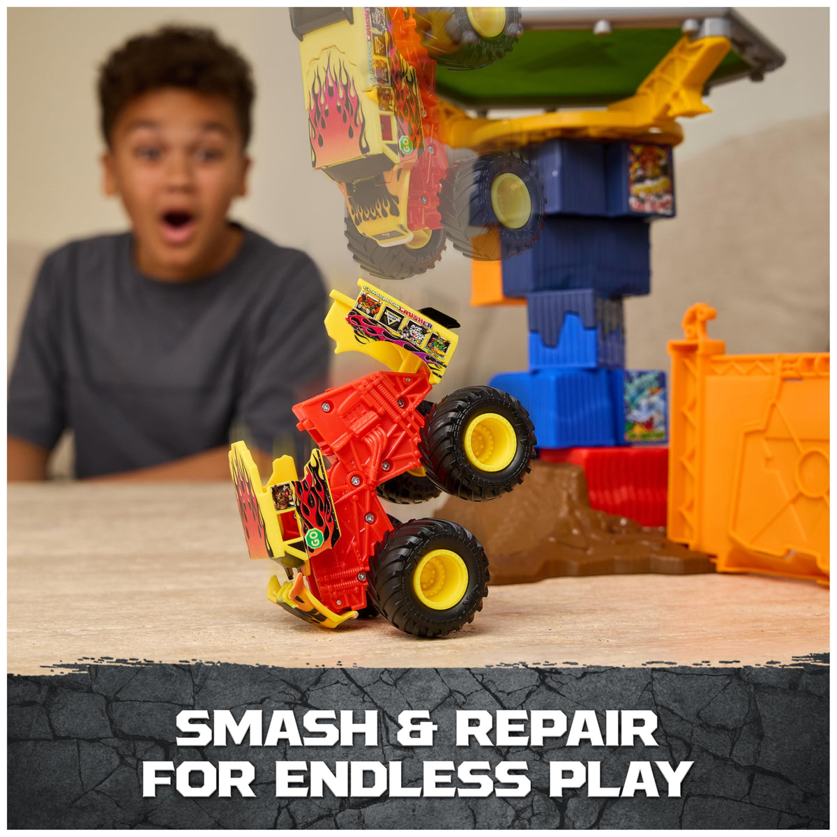 Monster Jam crash and rebuild feature lets kids restore the tower for endless play.