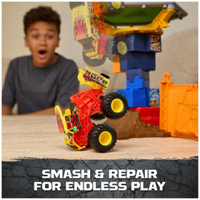 Monster Jam crash and rebuild feature lets kids restore the tower for endless play.