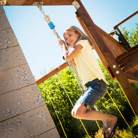 MONT PLEASANT treehouse rope enhances outdoor play space.