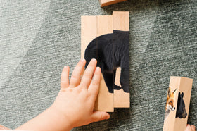 Montessori & Me animals matching and sounds activity supports language development.