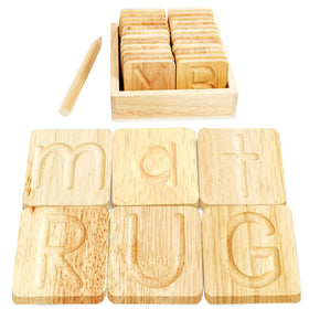 Montessori Me wooden alphabet tracing board supports early letter formation.