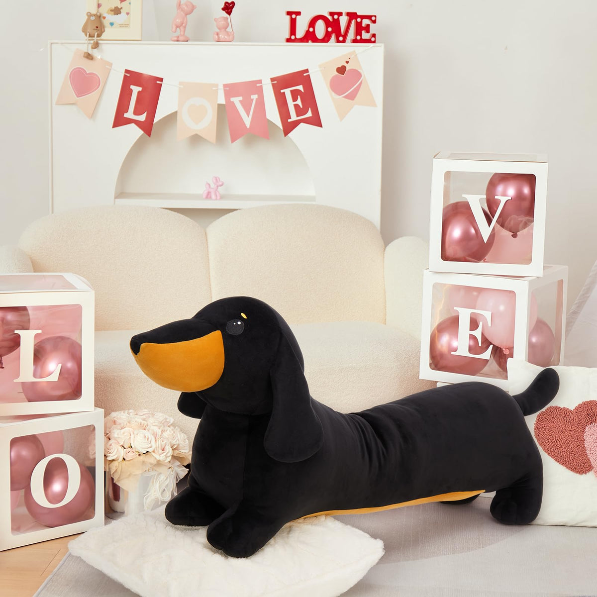 Moris-Mos dachshund plush in car seat adds travel charm