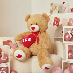 MorisMos giant teddy bear on bed decor adds a comforting focal point