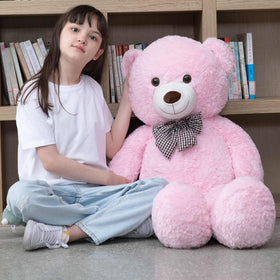 Gift-ready MorisMos bear at a birthday surprise setup
