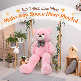 Child hugs MorisMos pink teddy bear during bedtime stories