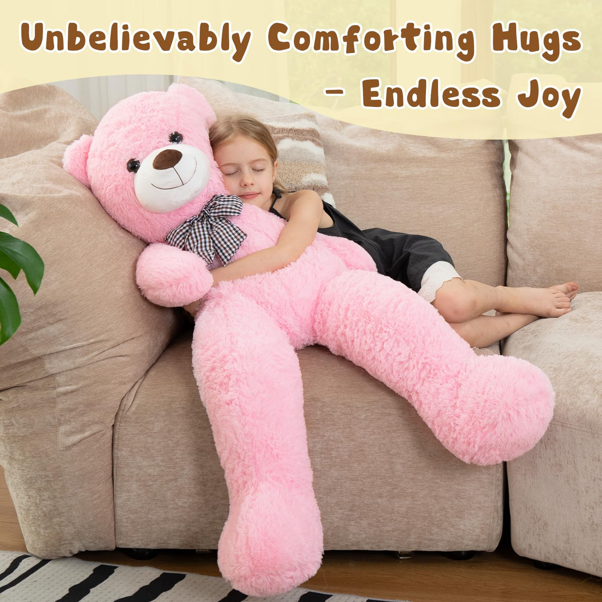 MorisMos pink teddy bear shown in a bedroom display as a warm decorative friend.