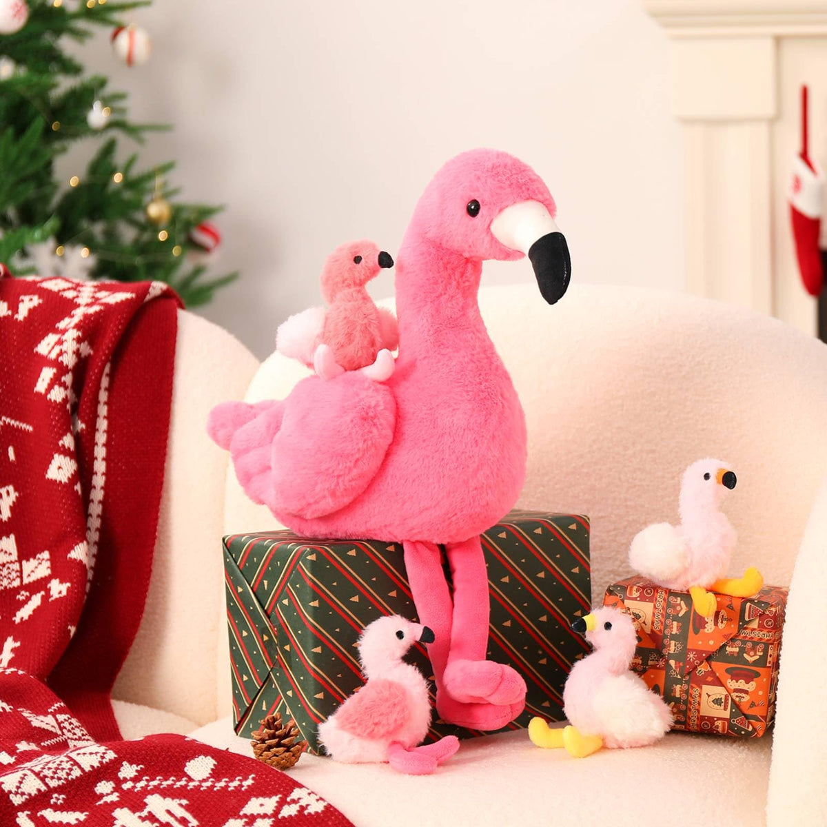 Zipper tummy opens to reveal baby flamingos for interactive surprise and sharing.