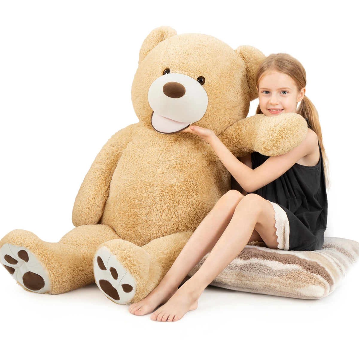 MorisMos smiling giant teddy bear in a cozy room, ideal for hugs and decor