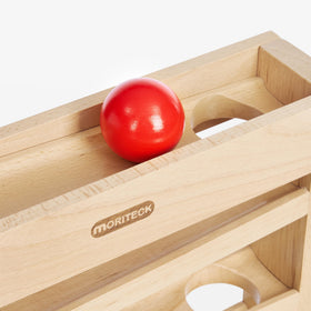 Moriteck Montessori Ball Drop Toy baby using the tracker to guide balls.