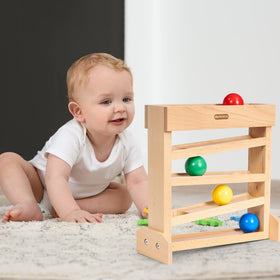 Moriteck Montessori Ball Drop Toy interactive play encouraging hand-eye coordination.