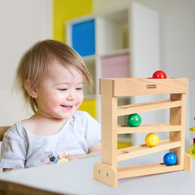 Moriteck Montessori Ball Drop Toy side view captures parent-friendly durable wooden construction.