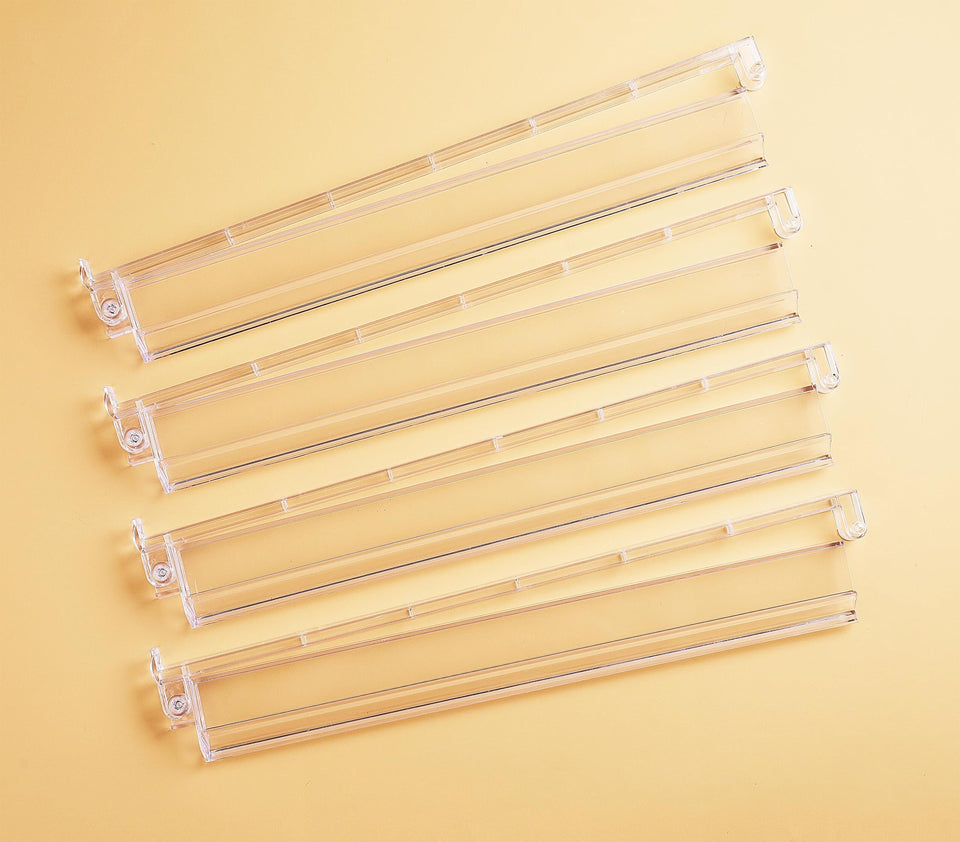 Mose Cafolo clear Mahjong rack pushers set of four arranged for a neat wall display