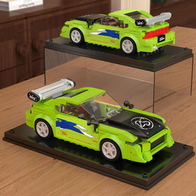 Mould King Speed Champion acrylic display case highlighting vintage racing model.